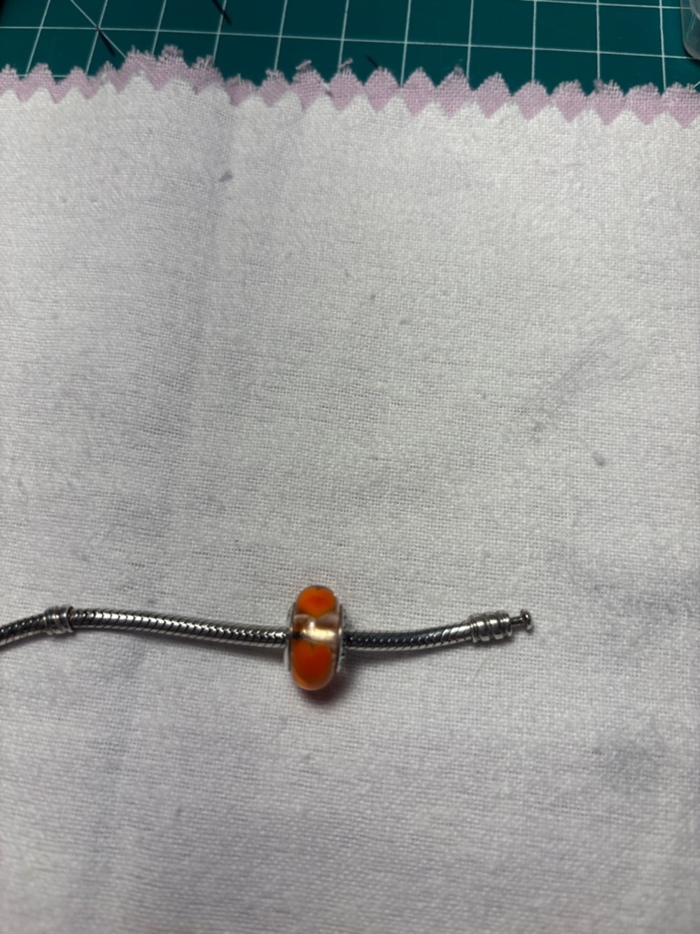 Pandora Orange and Silver Charm Bead